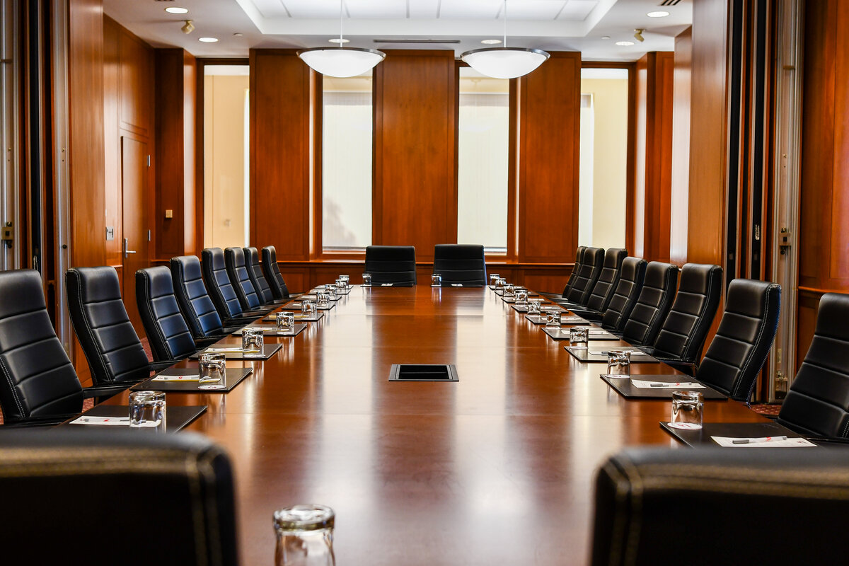 a conference room with chairs and a table
